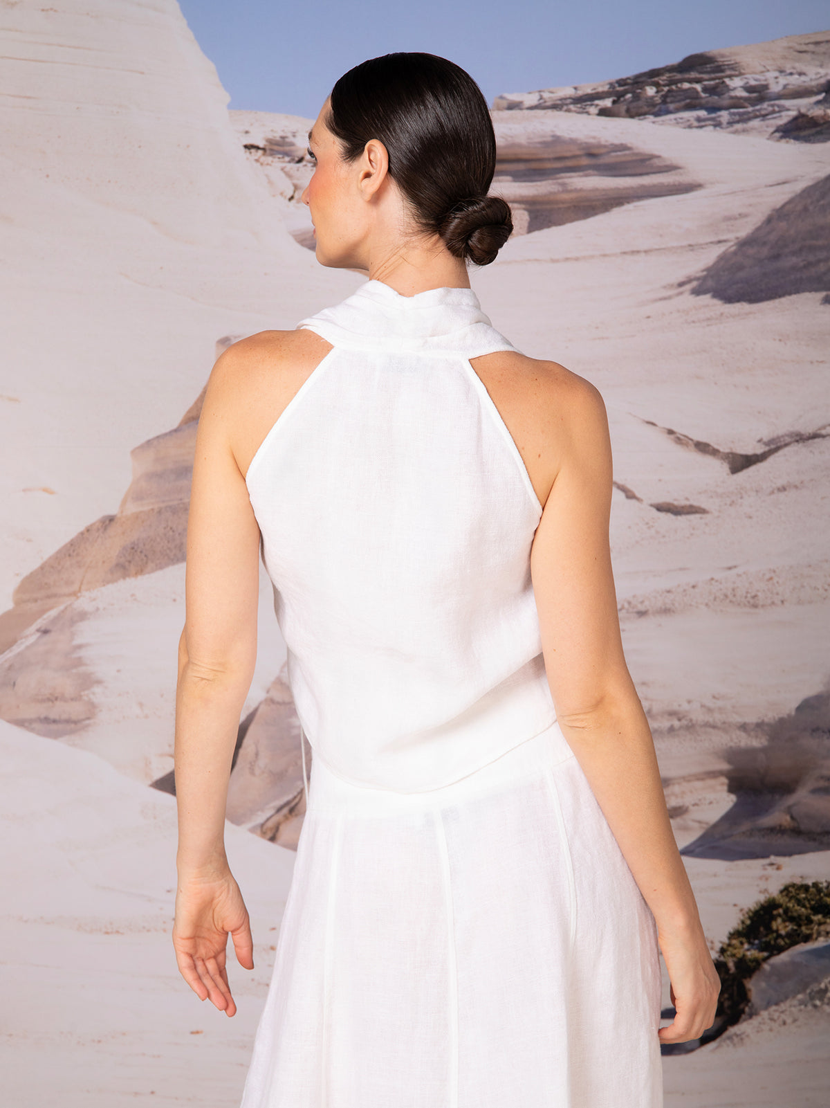 Crossed blouse with pleats in linen