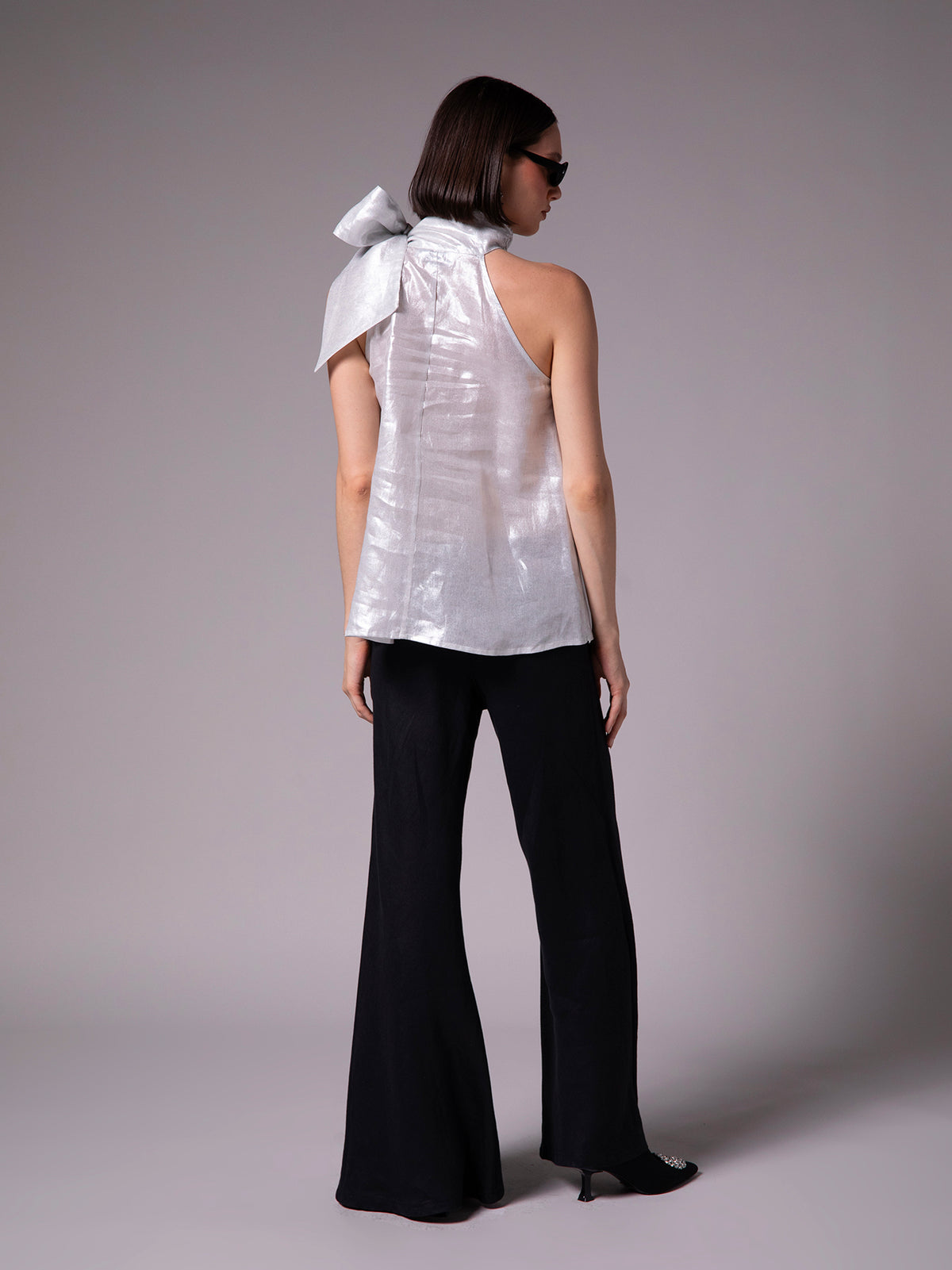 Pleated halter neck blouse with tie in metallic linen