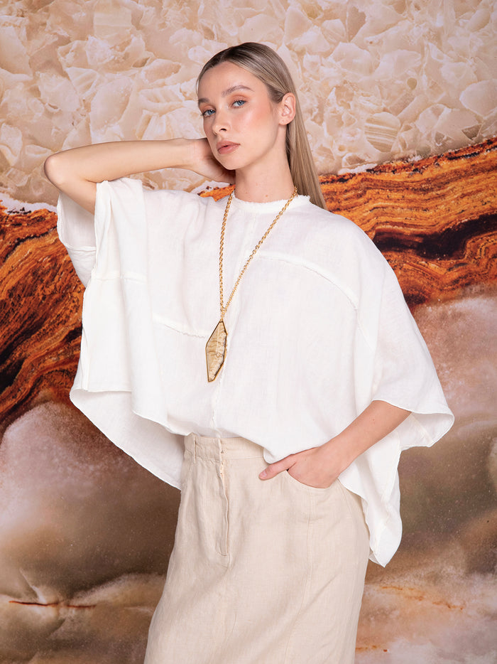 Blouse with panel cuts in linen