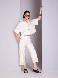Shirt-style blouse with robe-inspired panel cuts in linen