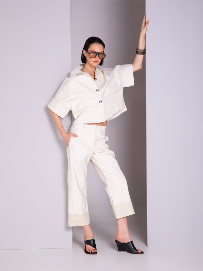 Shirt-style blouse with robe-inspired panel cuts in linen