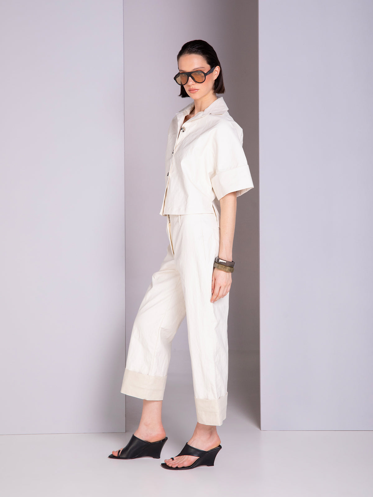 Shirt-style blouse with robe-inspired panel cuts in linen