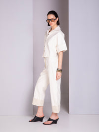 Shirt-style blouse with robe-inspired panel cuts in linen