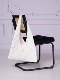 Origami-style bag with sequin appliqués in linen