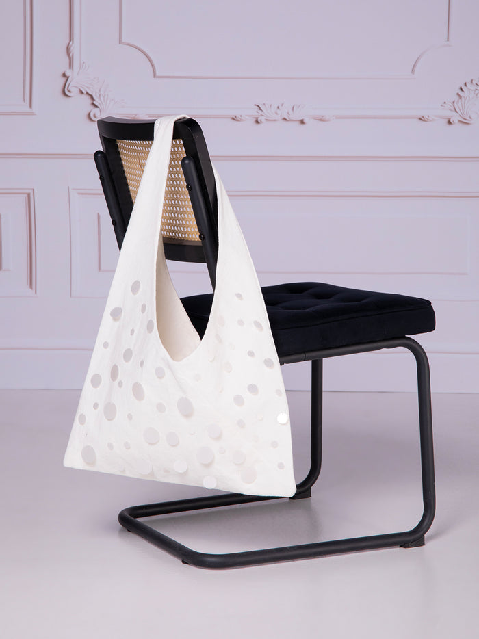 Origami-style bag with sequin appliqués in linen