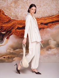 Double-breasted jacket with four buttons in linen