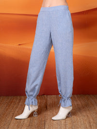 Pants with ankle straps in linen