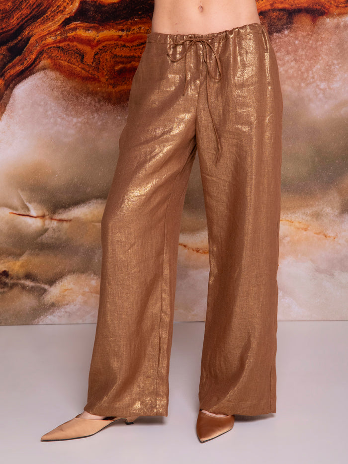Women's trousers with hidden pockets in iridescent linen