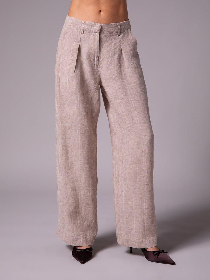 Relaxed-fit pants with front pleats in linen
