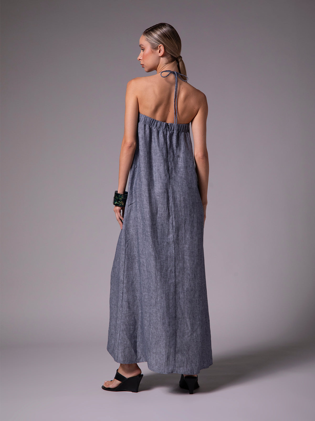 A-line dress with pleats and center strap in linen