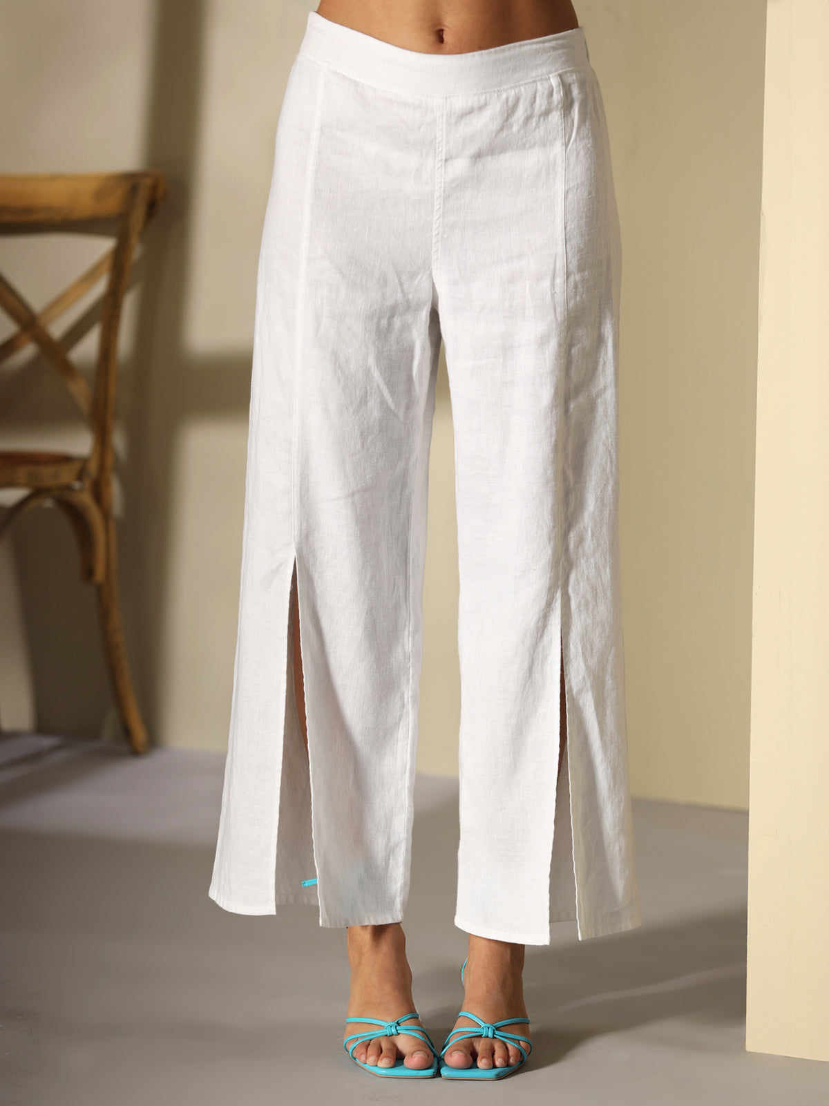 Straight leg pants with front slit in linen