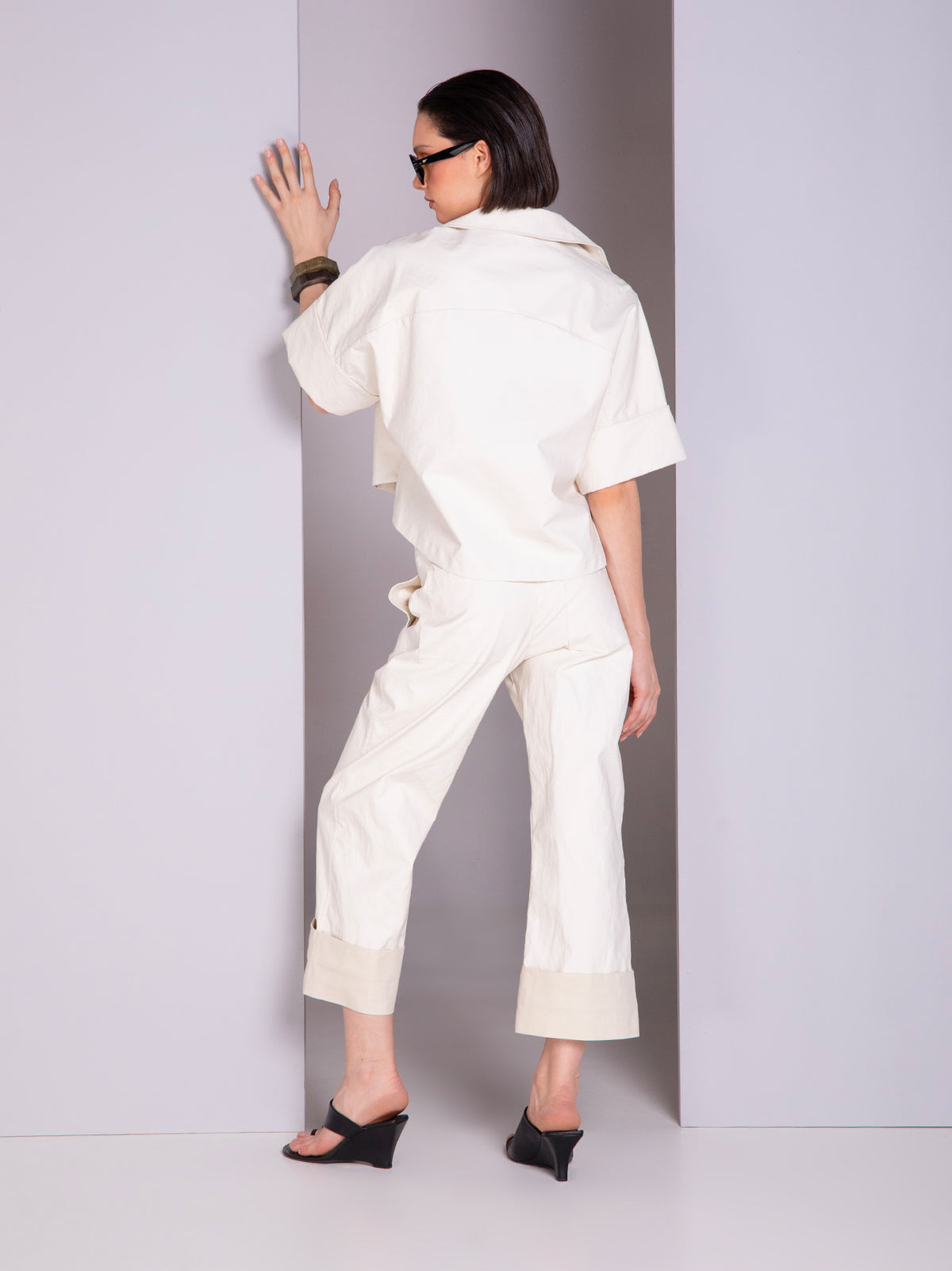 Shirt-style blouse with robe-inspired panel cuts in linen
